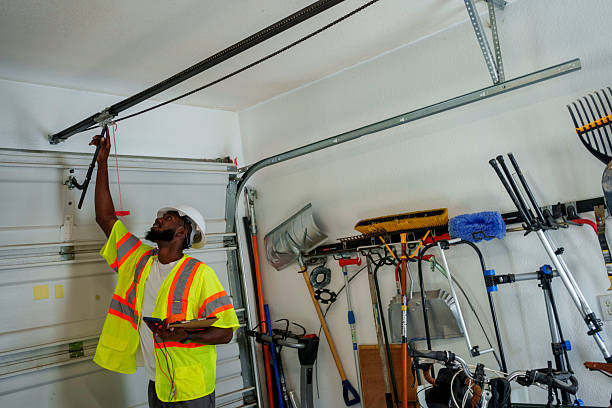 Professional Garage Door Panel Replacement technician working in Caro, MI